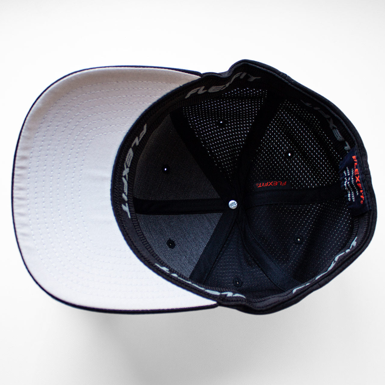 Our signature RUN cube design on a performance running hat (inside hat view)that is part of our RUN gift box set from TWO CORRALS Lifestyle Running Brand