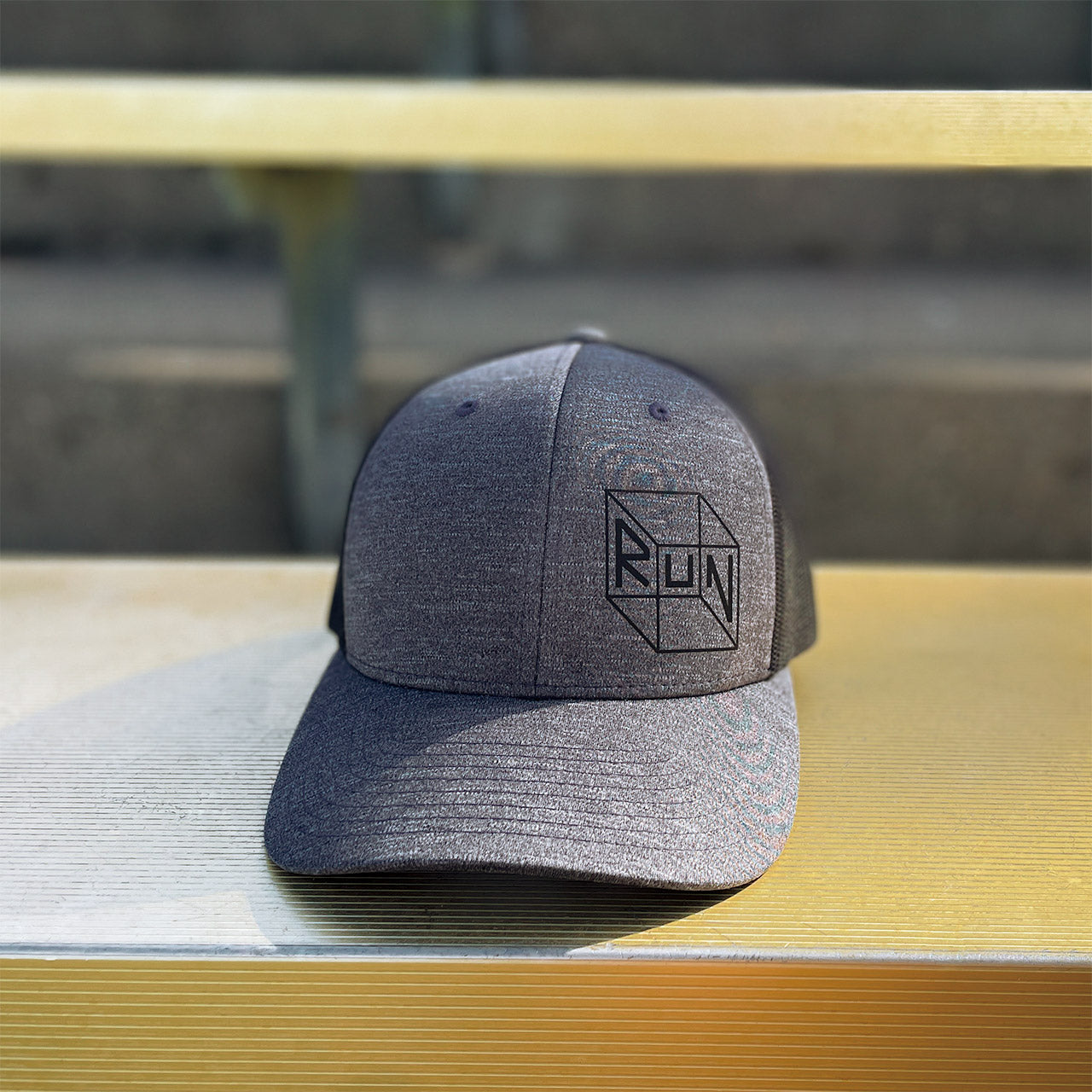 Trucker running hat from TWO CORRALS Lifestyle Running Brand, minimalistic run hat in dark gray and black